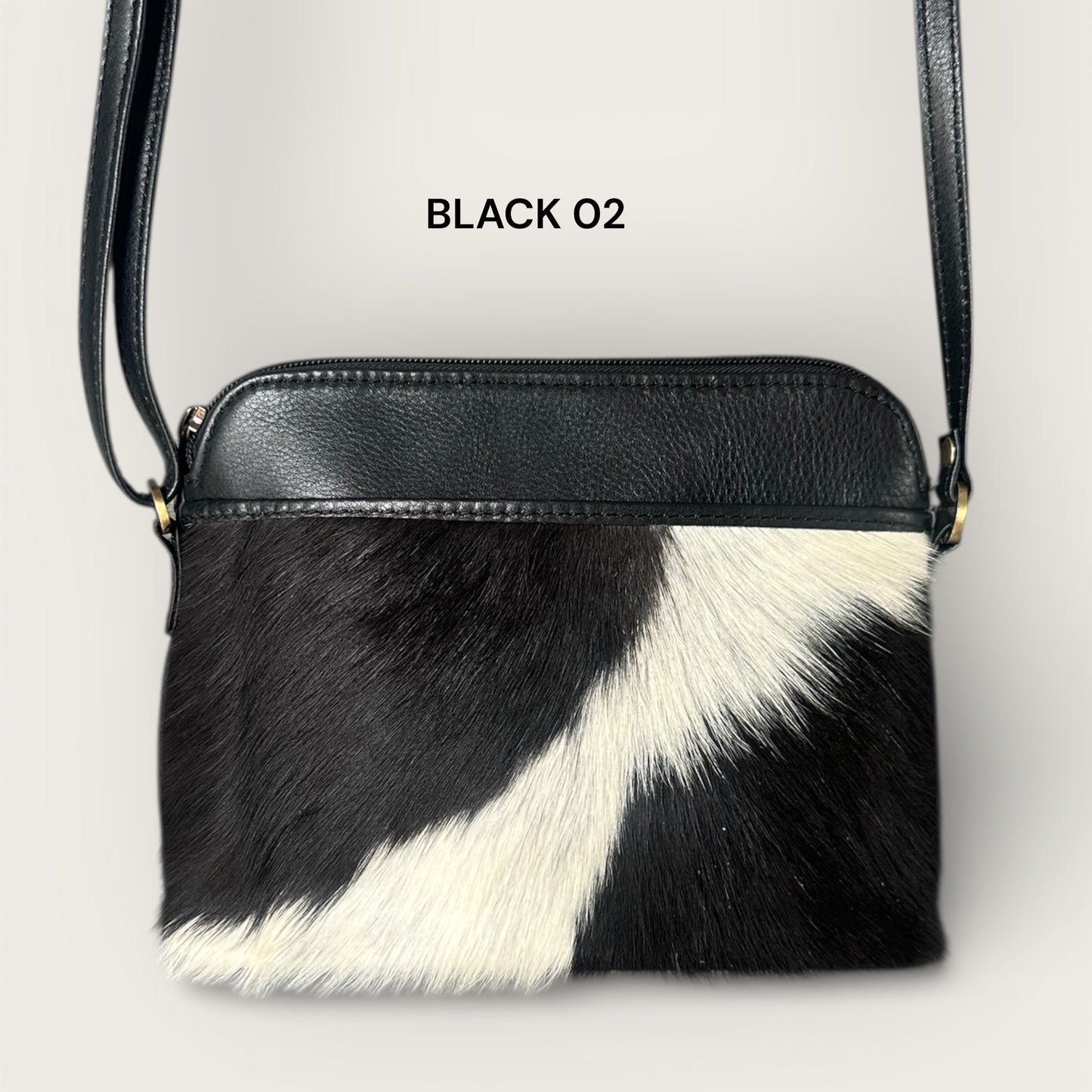 Cowhide and leather crossbody bag in black & white