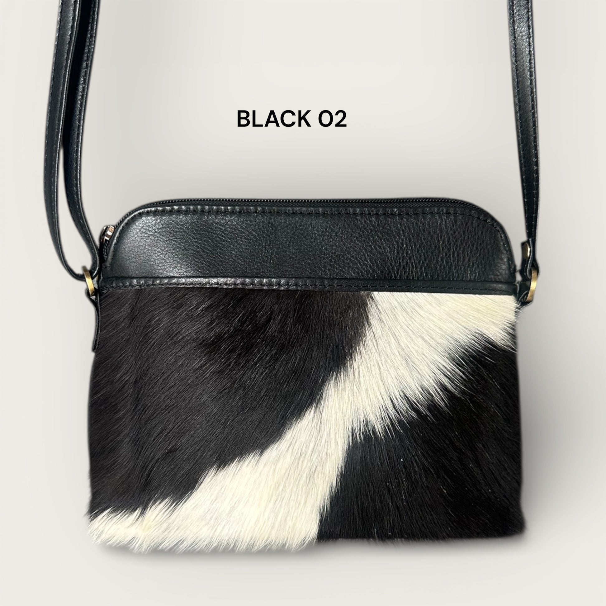 Cowhide and leather crossbody bag in black & white