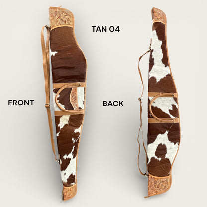 Cowhide and leather rifle gun bag in tan and white with tooling details