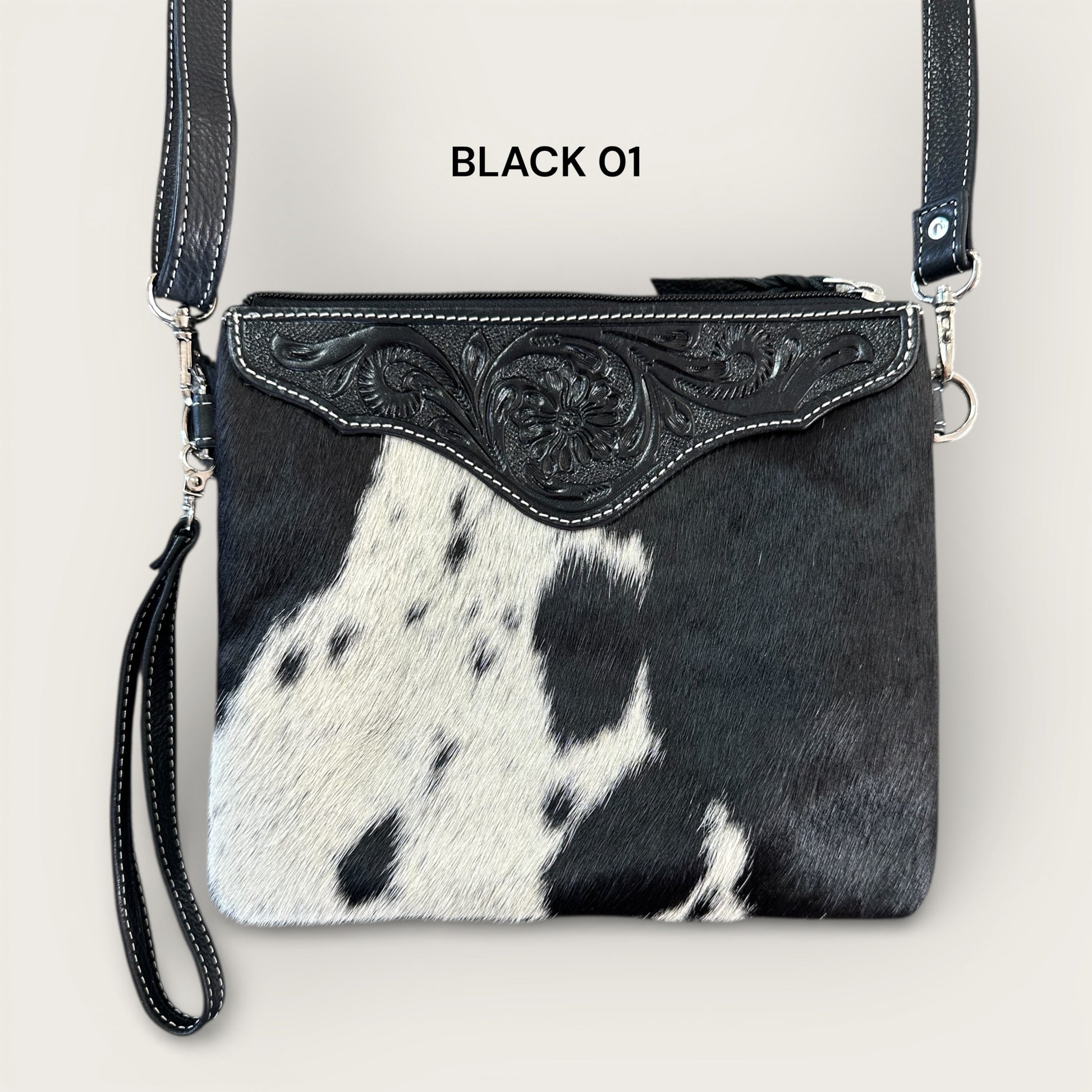 Black and White Cowhide and Leather Bag with Tooling Details 